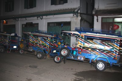 The next morning, I went to the main street to see the big procession of monks. These are Luang Prabang taxis.