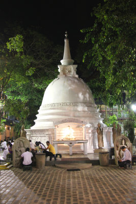 Stupas in Sri Lanka are shaped like bells such as this beautiful Cetiya Stupa in the Gangaramaya (Vihara) Buddhist Temple.