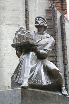 Close-up of the sculpture of Yaroslav the Wise. He is holding a model of Saint Sofia Cathedral.