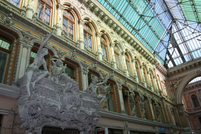 View of the upper details and glass ceiling of the Passage Mall.