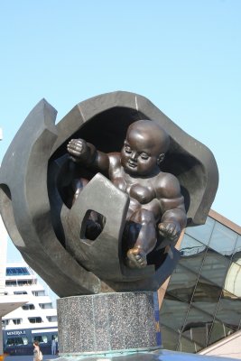 Golden Boy Statue in front of the Marine Station building.