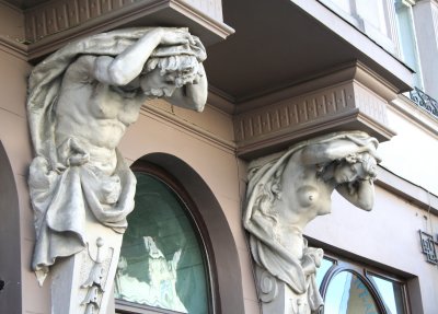 Close-up shot of another building with cariatides.