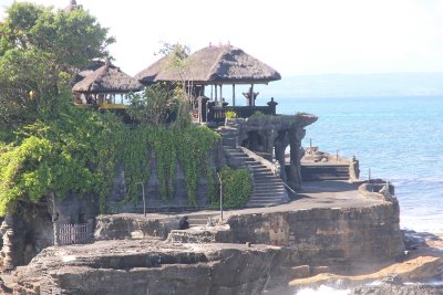The 15th century temple sits on a large offshore rock which has been shaped continuously over the years by the ocean tide.
