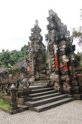 Impressive gateway and door at the temple. Legend has it that the sacred spring was created by the god Indra.