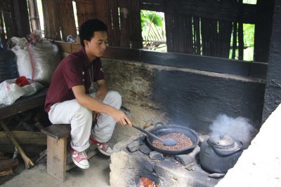 Next, I went to a coffee plantation where this man was roasting coffee beans.
