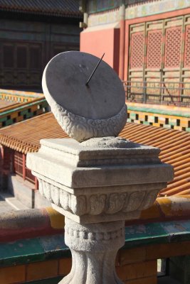 Sundial, with its intricate detailing, is located outside the Emporer's wife's quarters, the Palace of Earthly Tranquility.