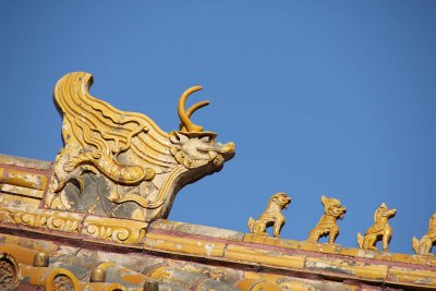 Close-up of the dragon on the left.