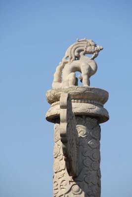 Unusual dragon statue on top of a pillar that I saw walking towards Tian'anmen Square.