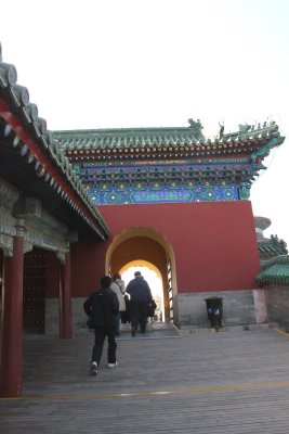 Arched doorway ahead that lead to the Hall of Prayer for Good Harvest.
