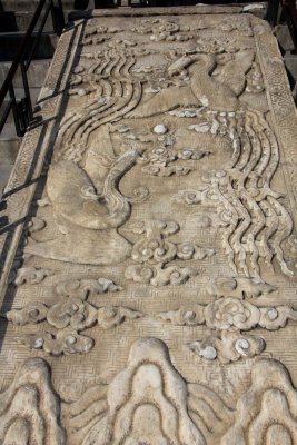 One of three magnificent stone carvings in the middle of one of the staircases leading up to the hall.