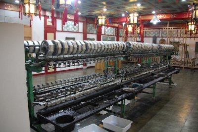 Machine in the silk factory where the silk is spun into thread.