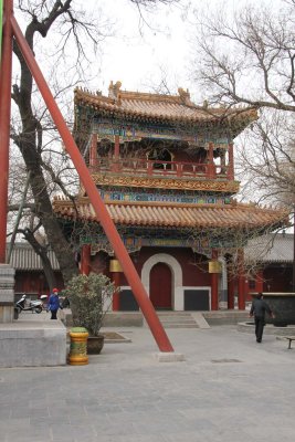 Smaller building flanking the side of the temple.