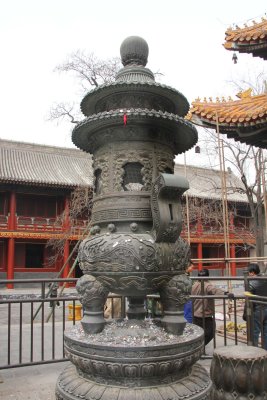 Another magnificent metal urn at the Lama Temple. Note the coins tossed at its base for good luck.