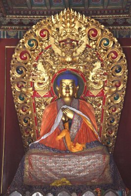 The Hall of Harmony and Peace is adorned with statues of three Buddhas.