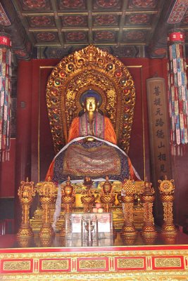 Statue of the Bhaisajya-guru (healing Buddha) in Hall of Everlasting Protection.