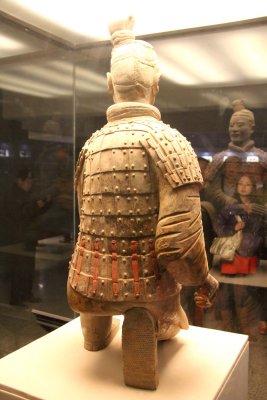 Note the chest and back armor and the square-toed shoes.