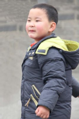 A chubby Chinese boy who was on the city wall that day.