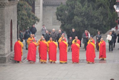 Close-up of the monks converging.