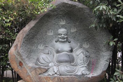 In the garden was the most famous happy Buddha in Xi'an.