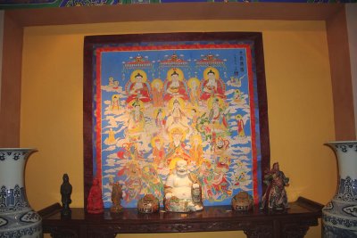 Colorful Buddhist tapestry and shrine in Xian.