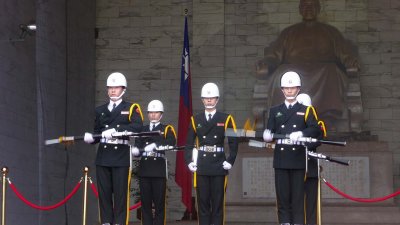 The soldiers were also twirling their rifles.