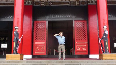 Me saluting the martyrs with the guards standing by.