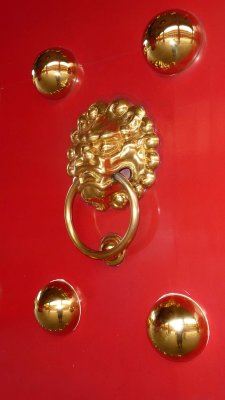The doors have beautiful brass hardware.