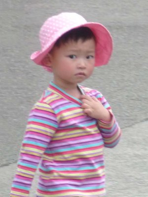 This cute Chinese girl was dressed for the spring weather.
