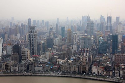Below, is the Bund with colonial buildings along the Huangpu River.