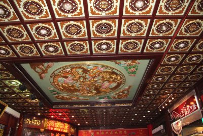 Elaborate ceiling design near the covered shopping area.