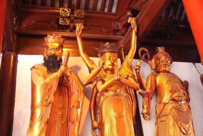 These statues, covered in gold, lining the eastern and western sides of the Grand Hall, are of the Gods of the Twenty Heavens.