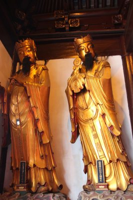 More golden Buddhist statues, on the eastern side of the Great Hall, including these two Arhats.