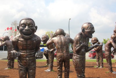 Next to the Sylvia Hotel along English Bay and Stanley Park were these statues by Chinese artist Yue Minjun.