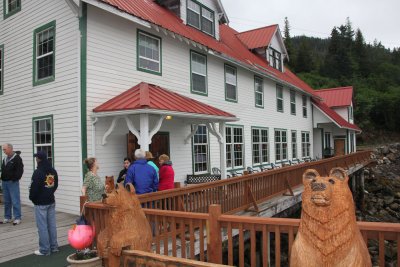 View of the lodge and of some carved bears.