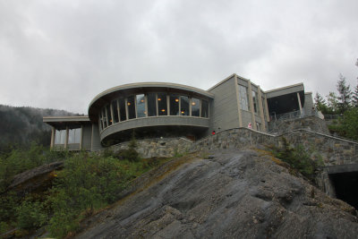 Mendenhall Glacier observation deck and visitor center on the rocks above.
