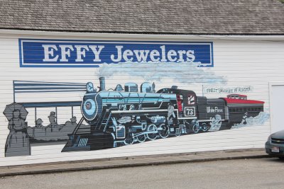 A great mural of the White Pass & Yukon Route Railroad on a wall outside of Effy Jewelers in Skagway.