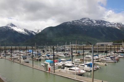 The pier near the Skagway Fish Company with pleasure boats docked there.