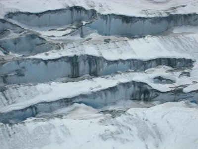 Deep ice crevices below.
