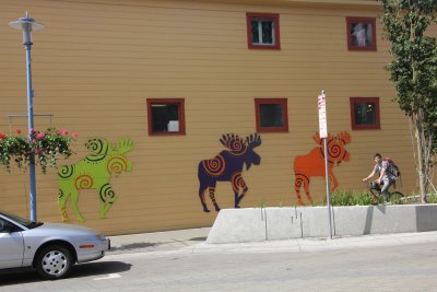 Further down the street, are these moose depictions.
