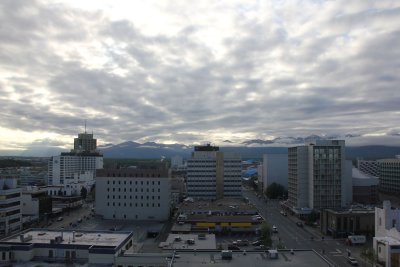 The clouds over the city were very dramatic that day.