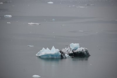 Close-up of an iceberg with the blue tint of glacial ice.