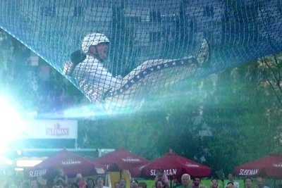 The human cannonball as he landed in a net after being shot through the air.