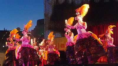 Colorful chorus girls who wore hoop skirts and masks.