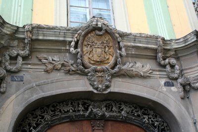 Coat of arms over the doorway.