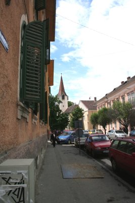 View of a tower down a Sibiu street.