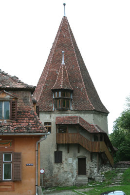 The Shoemaker's Tower with a tiled roof.