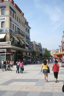 Women walking in the main square towards Plovdiv's Main Street.