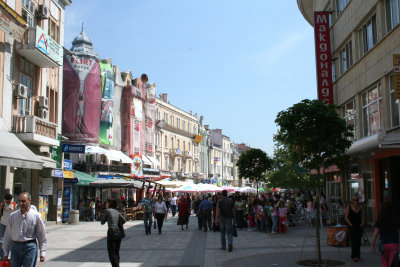 People strolling and shopping on Main Street.