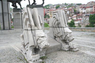 Gargoylesque sculpture at the base of the Monument of the Assens.