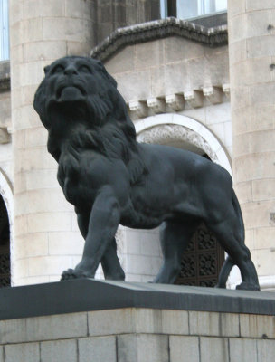Close-up of the lion sculpture in front of the Law Courts.